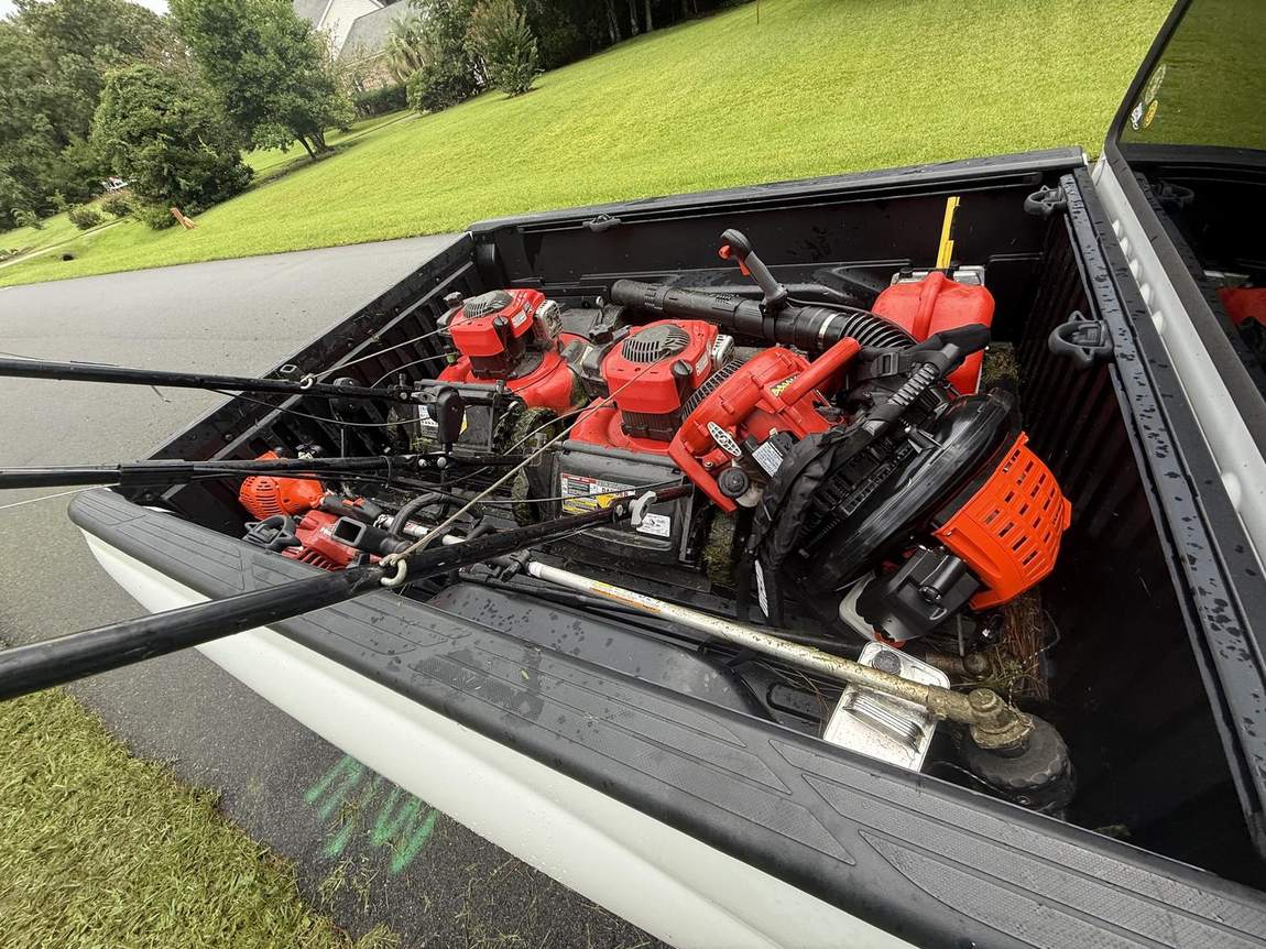 Echo trimmers and blowers loaded in the truck bed