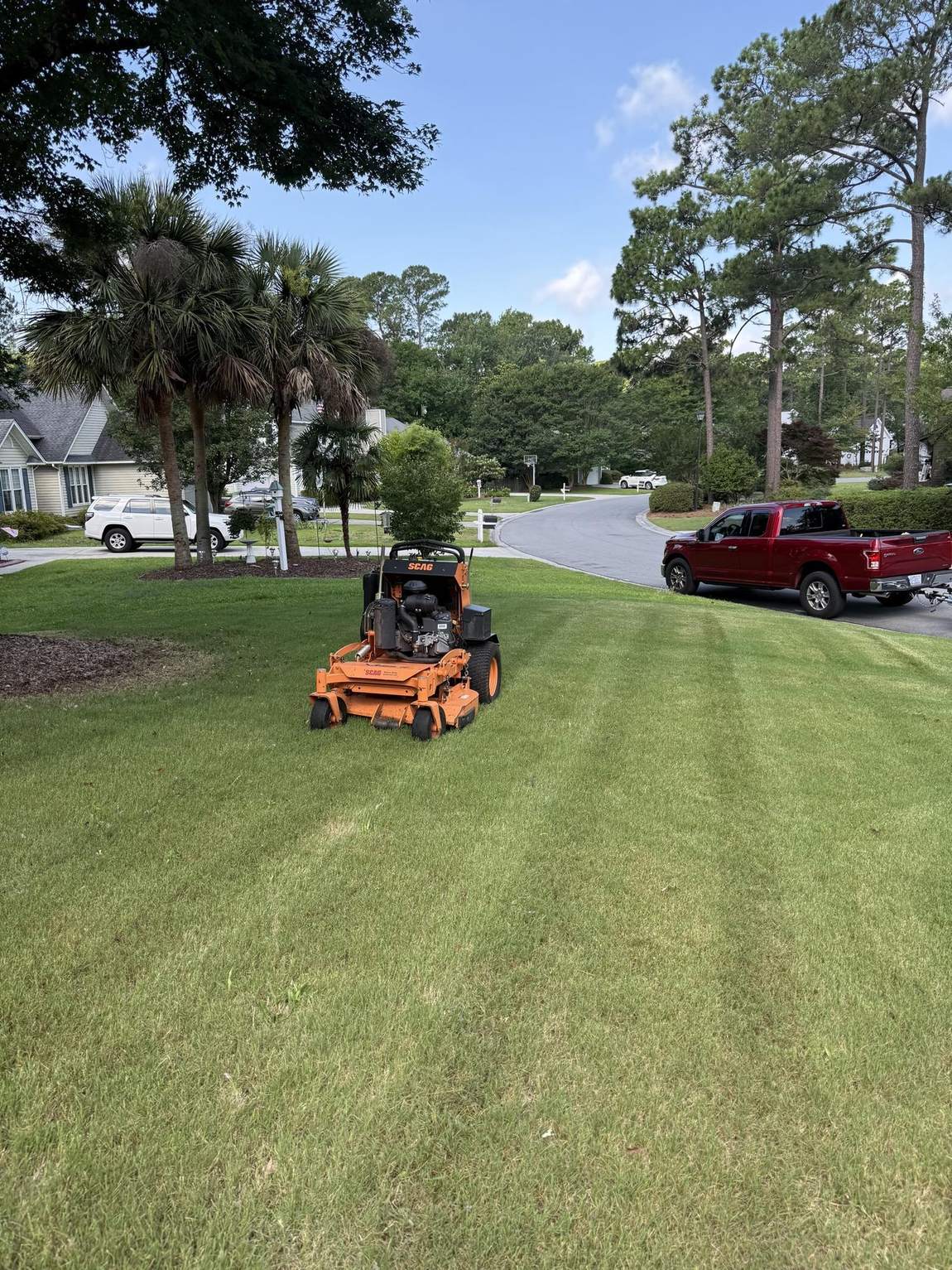 Scag mower parked on a finished lawn